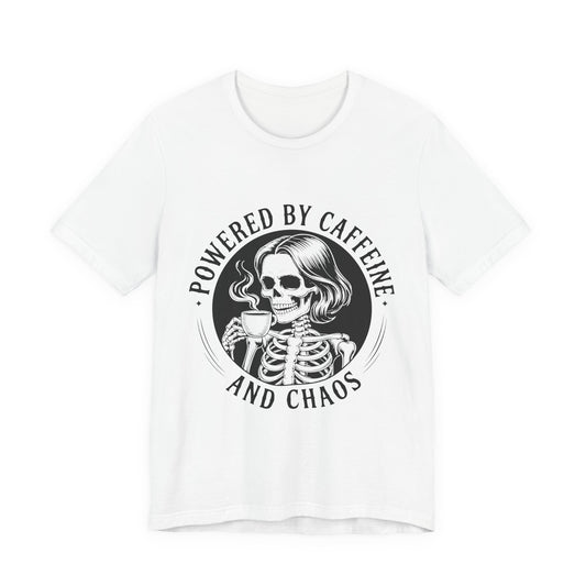 Powered by Caffeine and Chaos skeleton drinking coffee t-shirt in detailed ink style on a light tee