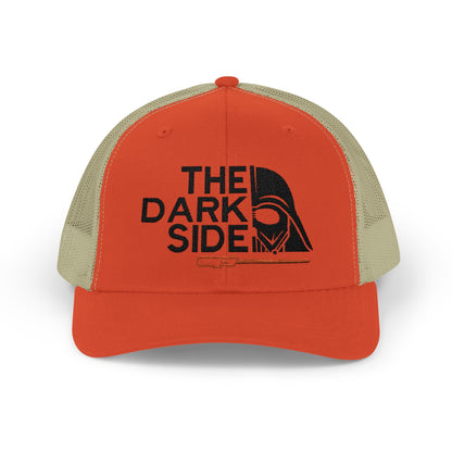 Orange and beige cap with black "THE DARK SIDE" text and helmet graphic on the front.