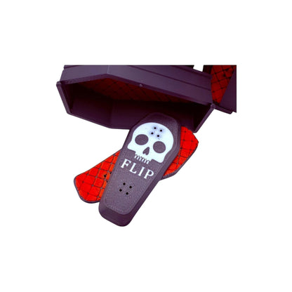 Wacky McLovin Prints coffin-shaped fingerboard display case with skull graphic and red interior.
